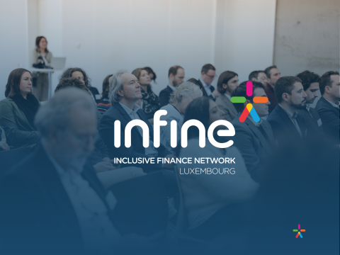 A group of people un suits listening a conference with the logo of Infine
